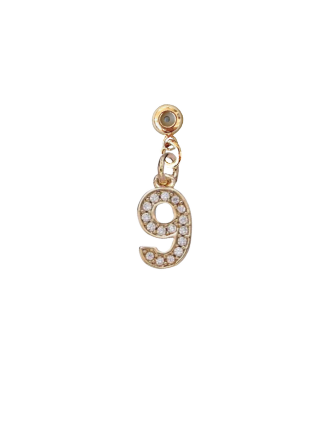 The Kinsey Designs Numerical Grip Charm is shaped like the number 9 and adorned with sparkling cubic zirconia, shown on a white background—perfect to add to your charm necklace.