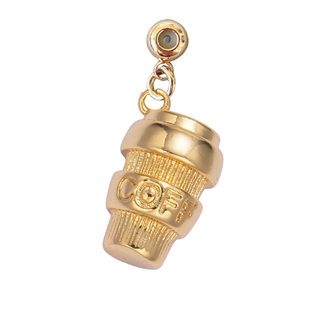 The Coffee Grip Charm by Kinsey Designs Archives features "COFF" engraving, a gold-filled finish, and a small round loop—ideal for attaching to Charm Bar Chains.