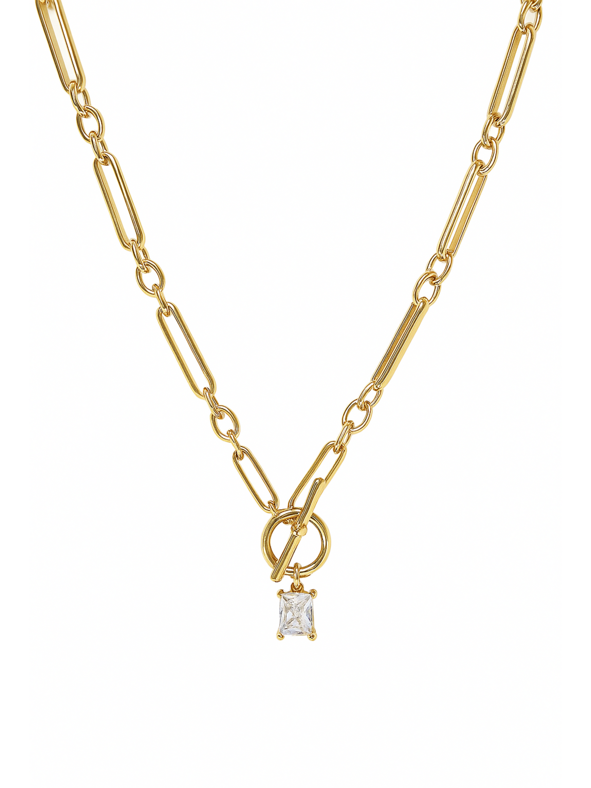 The Gilmore Necklace by Kinsey Designs features elongated gold-filled links and a square-cut clear gemstone pendant, suspended from a classic toggle clasp.
