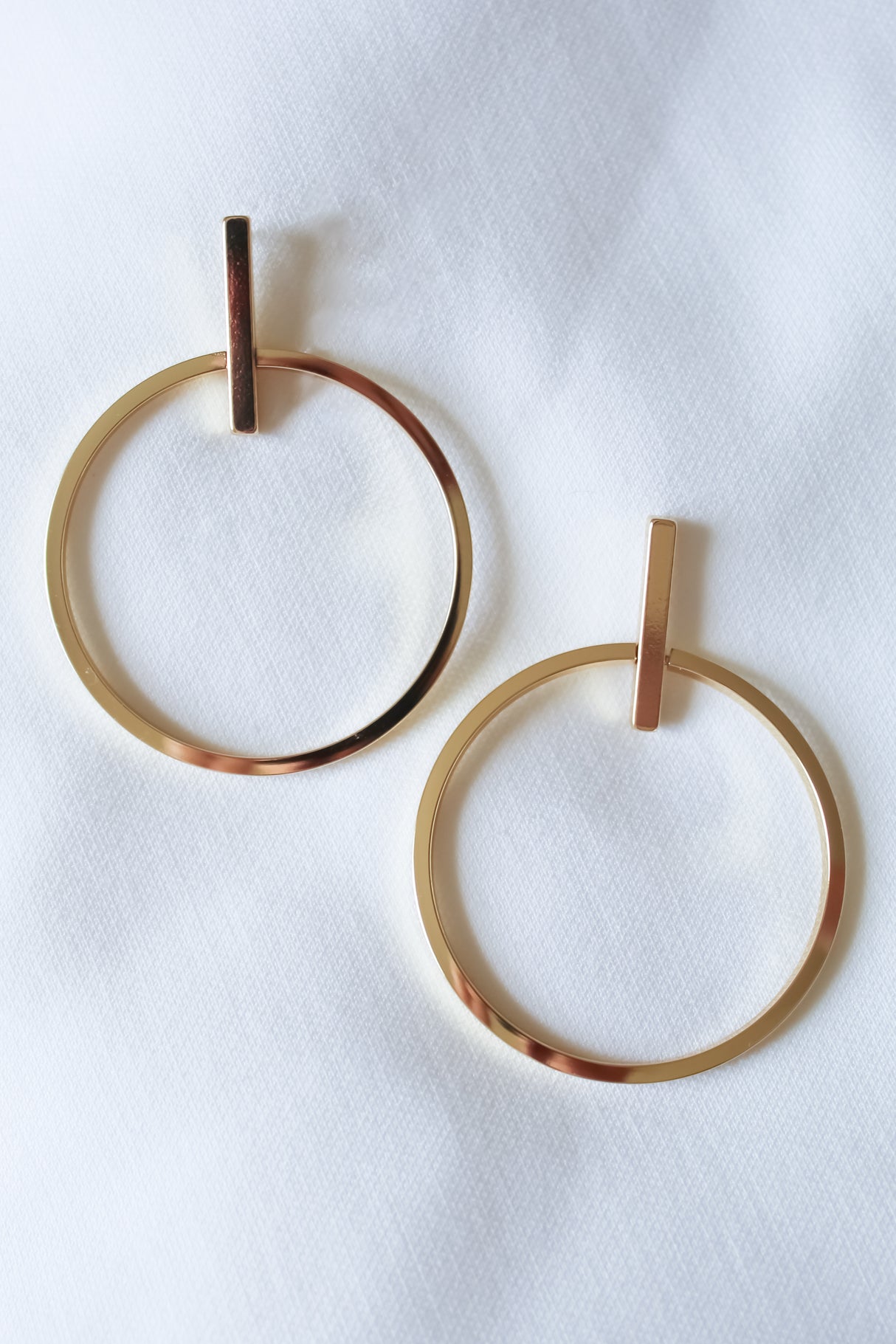 Josie Hoop gold filled earrings by Kinsey Designs Archives with vertical bars, shown on white fabric. SAMPLE SALE—final sale, no returns.