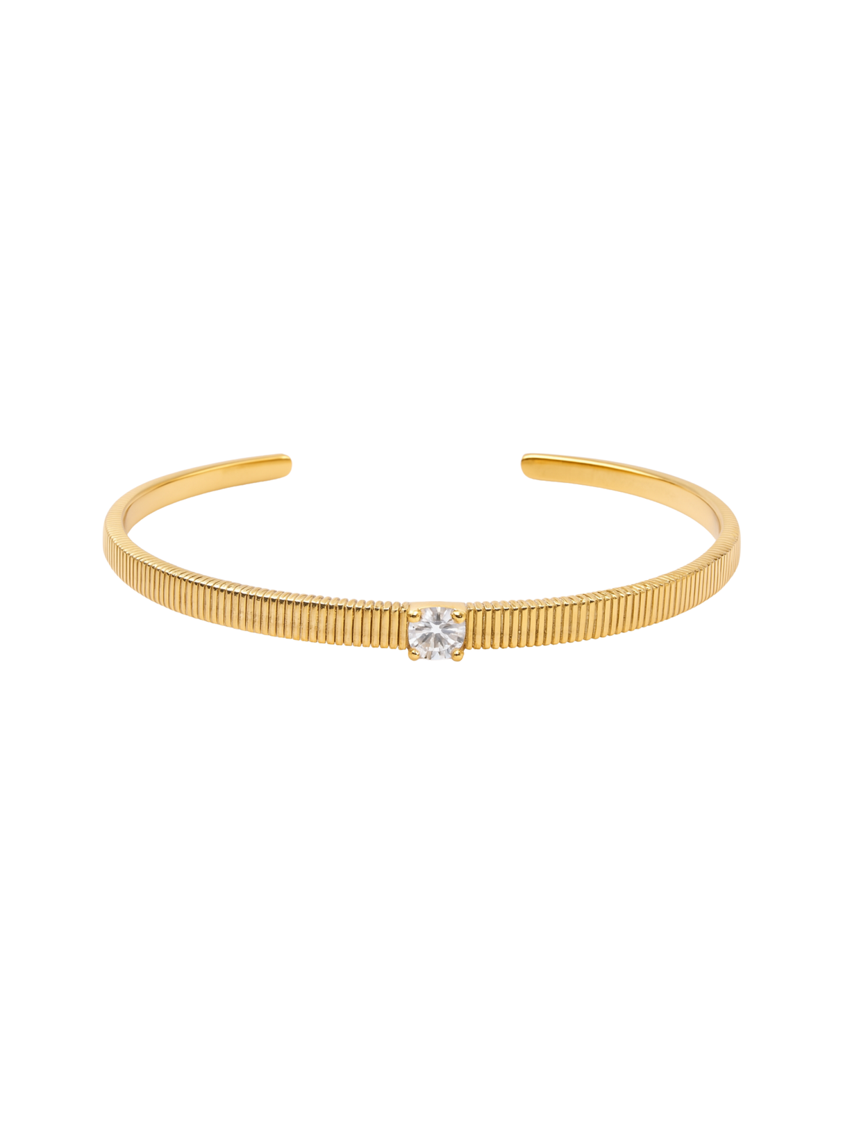 The Quinn Cuff by Kinsey Designs is a gold filled adjustable bracelet with a textured band and a single clear gemstone at the center, shown on a white background.