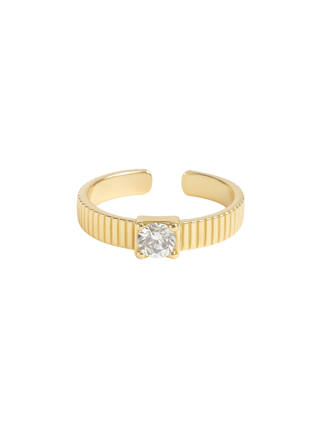 The Quinn Ring by Kinsey Designs is a gold open band with a sparkling CZ stone in a classic four-prong setting, perfect for stacking against a white background.