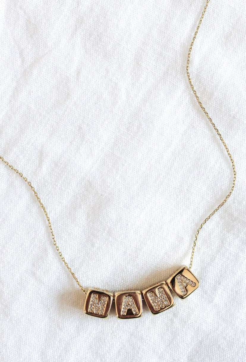 The Kinsey Designs MAMA Block Necklace features square letter charms spelling "MAMA"—a meaningful mama necklace and thoughtful Mother’s Day gift.