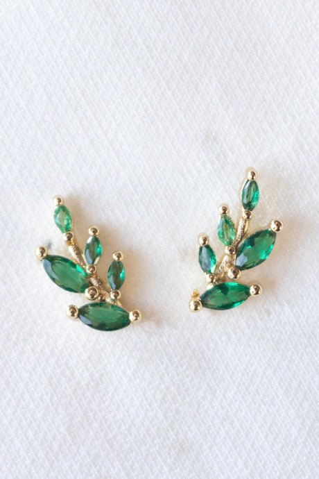 The Briar Stud by Kinsey Designs Archives features gold filled earrings with green marquise-shaped stones and sparkling cubic zirconia in a leafy branch design, measuring 0.5" wide, shown on a white background.
