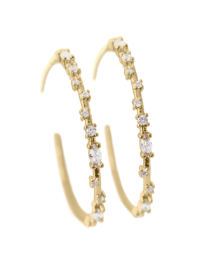 The Kinsey Designs Chase Hoop Large earrings feature gold-filled hoops adorned with small, round white gemstones along the front edge, showcased against a white background.