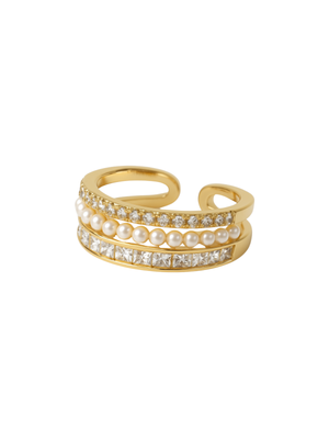 The Ellana Pearl Ring by Kinsey Designs features rows of pearls and clear gemstones on a gold open, adjustable band, radiating elegance.