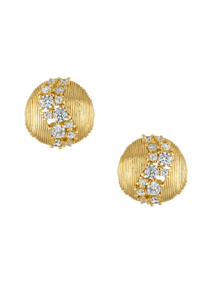 The Finn Post Earring by Kinsey Designs features round gold posts adorned with CZ stones and a diagonal row of sparkling diamonds on a textured surface.