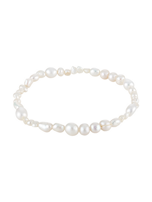 The Kinsey Designs Freshwater Pearl Stretch Bracelet features irregularly shaped white pearls, creating a delicate and elegant look.
