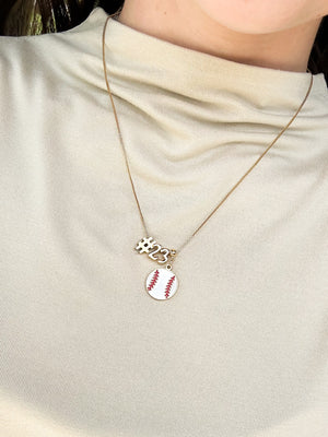 Kinsey Designs Number Symbol Spacer Slide "#23" and a baseball slide charm necklace, styled over a cream-colored shirt.