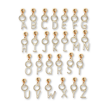 Kinsey Designs Archives Letter Grip Charms from A to Z arranged in rows on a white background, ideal for creating personalized jewelry.