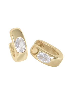 The Jack Huggie earrings by Kinsey Designs feature oval clear gemstones set in the center, shown on a white background. Part of our exclusive sample sale jewelry collection.