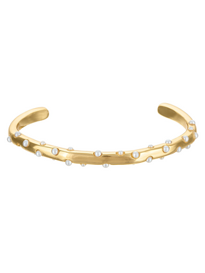 The Johanna Pearl Cuff Bracelet by Kinsey Designs features a gold filled design, beautifully accented with scattered small white pearls.