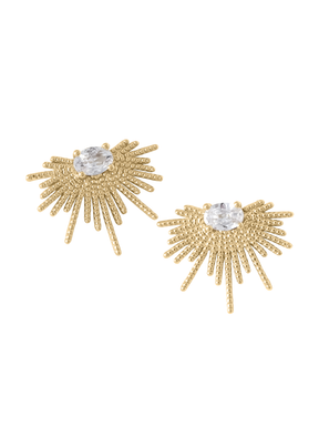 The Linga Earring by Kinsey Designs features gold-filled sunburst studs with textured rays and a central oval clear gemstone on each earring.