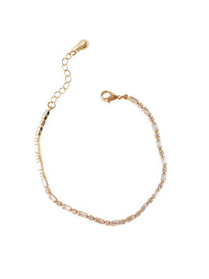 The Nora Bracelet by Kinsey Designs features rectangular clear cubic zirconia stones, a gold-plated finish, and an adjustable clasp, shown on a white background.