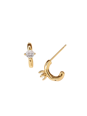 Elevate any look with Kinsey Designs’ Rugo Hoop earrings—a unique mismatched gold-filled pair, featuring one solitaire stone and one small claw-inspired design.