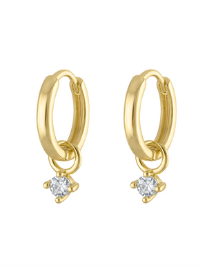 The Sloane Huggie Earrings by Kinsey Designs feature small gold hoops with CZ charm drops, ideal for minimal earring lovers. Shown on a clean white background.