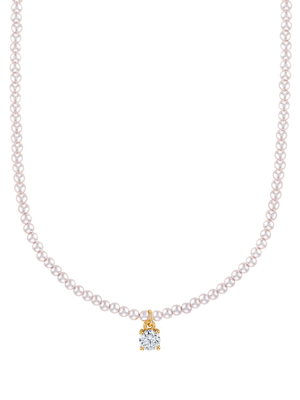 The Tilly Stone Necklace by Kinsey Designs showcases a stunning pearl necklace with a gold and diamond pendant, elegantly displayed on a white background.
