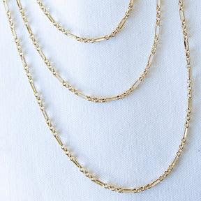 Three Tymes Necklaces by Kinsey Designs, featuring delicate alternating links, are displayed on a white background—ideal for a chic layered look. Don’t miss this exclusive sample sale find!.