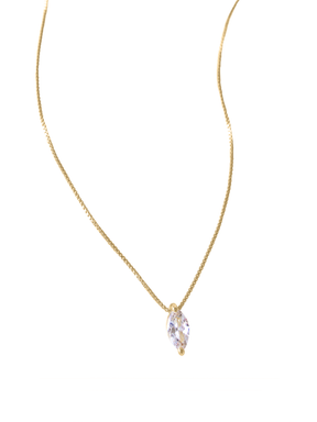 The Marquise Slide Necklace by Kinsey Designs Archives features a delicate gold-filled chain with a single marquise-shaped cubic zirconia pendant, shown on a white background.