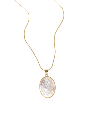 The Pippa Necklace by Kinsey Designs features a gold filled oval pendant with an engraved Madonna motif set on a mother-of-pearl background.