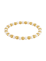 The Kinsey Designs Pearl and Gold Bead Alternating Stretch Bracelet features 4mm pearls and gold beads in an alternating pattern on a white background.