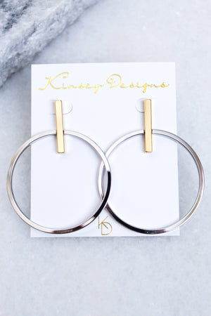 Jocelyn - Mixed Metals gold plated hoop earrings, 2” wide by 2.5” long, from Kinsey Designs Archives, shown on a white display card.