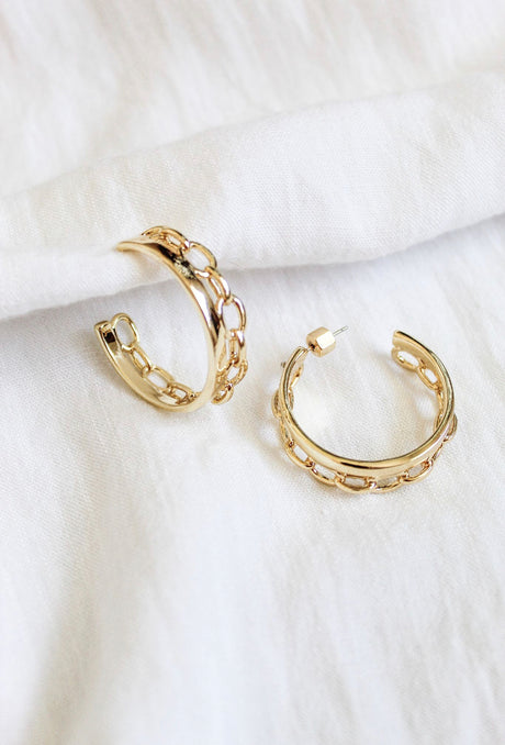 Two Beck Hoop earrings by Kinsey Designs, featuring 14k gold plating and a chain-link design, displayed on a white fabric background. Final Sale.