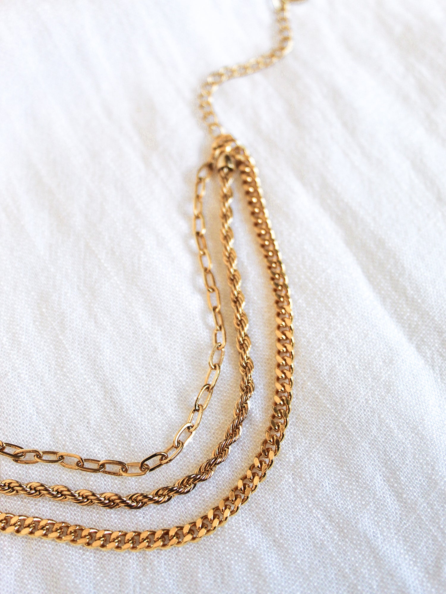 The Emmy Bracelet by Kinsey Designs Archives is displayed on a white fabric background.