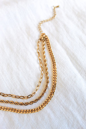 The Emmy Bracelet by Kinsey Designs Archives is displayed on a white fabric background.